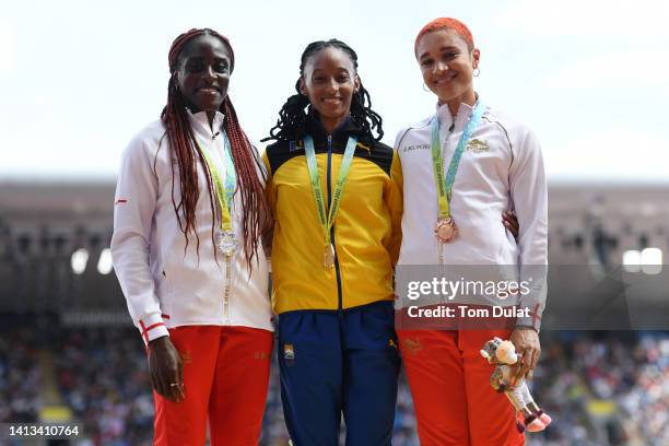 Silver medalist Victoria Ohuruogu of Team England, Gold medalist Sada Williams of Team Barbados and Bronze medalist Jodie Williams of Team England...