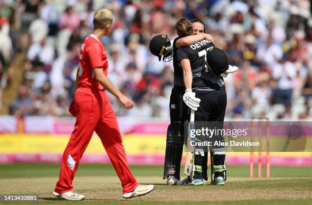 Sophie Devine and Amelia Kerr of Team New Zealand celebrates after victory in the Cricket T20 - Bronze Medal match between Team England and Team New...