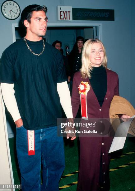 Eric Ettebari and Nicole Eggert at the Hollywood Christmas Parade, Hollywood, Hollywood.