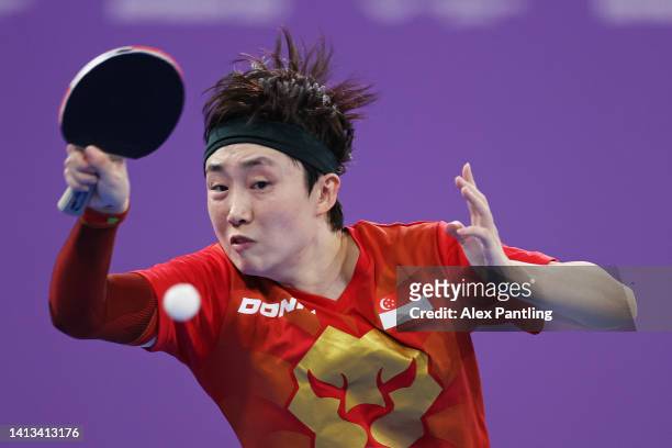 Tianwei Feng of Team Singapore competes during their Table Tennis Women's Singles Gold Medal match against Jian Zeng of Team Singapore on day ten of...