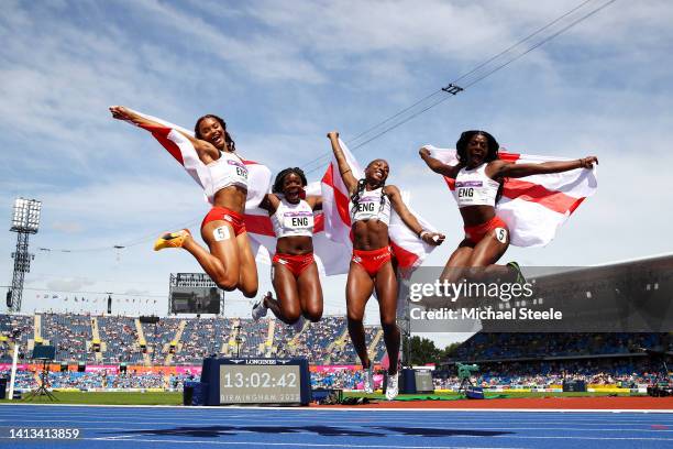 Asha Philip, Imani Lansiquot, Biancsa Williams and Daryll Neita of Team England celebrate winning the silver medal in the Women's 4 x 100m Relay -...