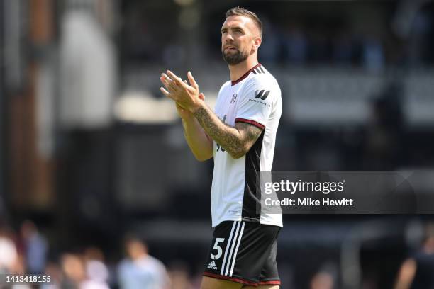 Shane Duffy of Fulham salutes the crowd at the end of the Premier League match between Fulham FC and Liverpool FC at Craven Cottage on August 06,...