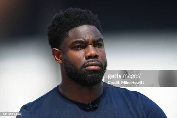 Pundit Micah Richards looks on prior to the Premier League match between West Ham United and Manchester City at London Stadium on August 07, 2022 in...