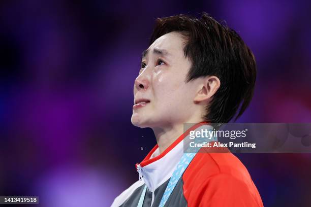Gold Medallist Tianwei Feng of Team Singapore celebrates during the Table Tennis Women's Singles Medal Ceremony on day ten of the Birmingham 2022...