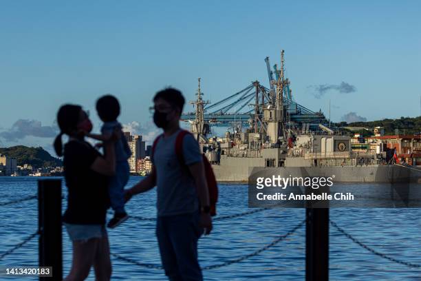 People visit the harbour where Taiwanese Navy warships are anchored on August 07, 2022 in Keelung, Taiwan. Taiwan remained tense after Speaker of the...