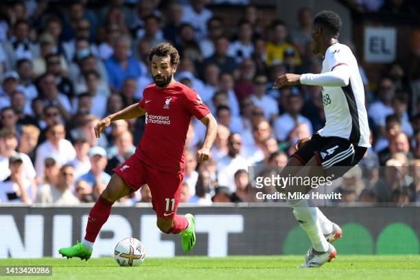 Mohamed Salah of Liverpool runs at 4 during the Premier League match between Fulham FC and Liverpool FC at Craven Cottage on August 06, 2022 in...