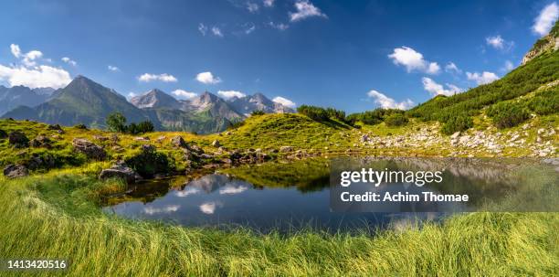 alpine lake, allgau alps, bavaria, germany - oberstdorf stock-fotos und bilder