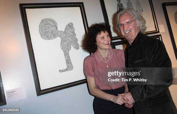 Cara Connolly and Billy Connolly at a private view of Billy Connollys debut art collection of fine art pen and ink drawings at The Halcyon Gallery,...