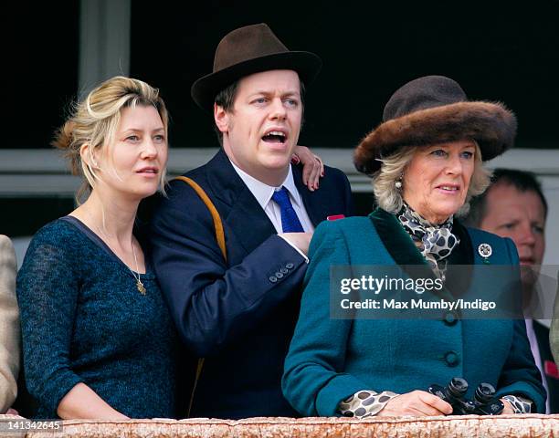 Sara Buys, her husband Tom Parker Bowles and Tom's mother Camilla, Duchess of Cornwall watch the racing on day 2 'Ladies Day' of the Cheltenham Horse...