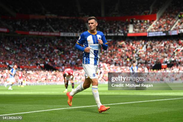 Pascal Gross of Brighton & Hove Albion celebrates after scoring their team's second goal during the Premier League match between Manchester United...