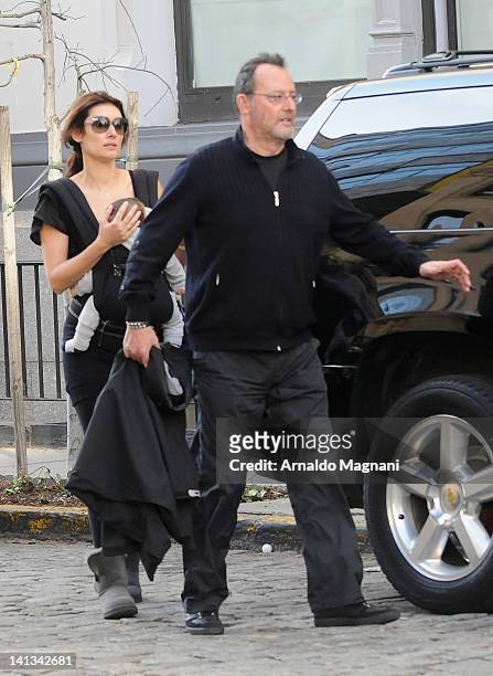 Model Zofia Borucka and actor Jean Reno are seen with their newborn baby on the streets of TriBeCa on March 14, 2012 in New York City.