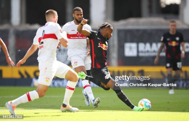 Christopher Nkunku of RB Leipzig scores their team's first goal during the Bundesliga match between VfB Stuttgart and RB Leipzig at Mercedes-Benz...