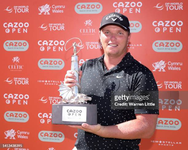 Callum Shinkwin of England poses for a photograph with the Cazoo Open Trophy after defeating Connor Syme of Scotland to win the Cazoo Open during day...