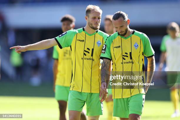 Marcel Seegert and Marco Hoeger of Waldhof Mannheim look dejected after the 2-2 draaw of the 3. Liga match between SC Verl and Waldhof Mannheim at...