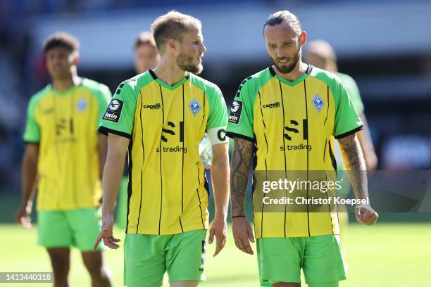 Marcel Seegert and Marco Hoeger of Waldhof Mannheim look dejected after the 2-2 draaw of the 3. Liga match between SC Verl and Waldhof Mannheim at...