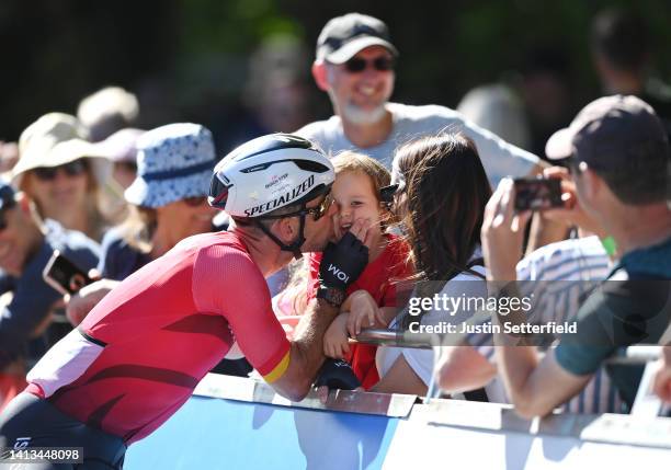 Mark Cavendish of Team Isle of Man interacts with their Wife, Peta Todd and hild following the Men's Road Race on day ten of the Birmingham 2022...