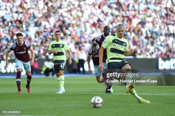 Erling Haaland of Manchester City scores a penalty for his team's first goal during the Premier League match between West Ham United and Manchester...