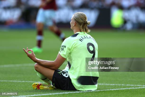 Erling Haaland of Manchester City celebrates after scoring their team's first goal from the penalty spot during the Premier League match between West...