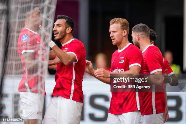 Vangelis Pavlidis of AZ Alkmaar celebrates after scoring his sides first goal with Tijjani Reijnders of AZ Alkmaar, Mees de Wit of AZ Alkmaar, Dani...