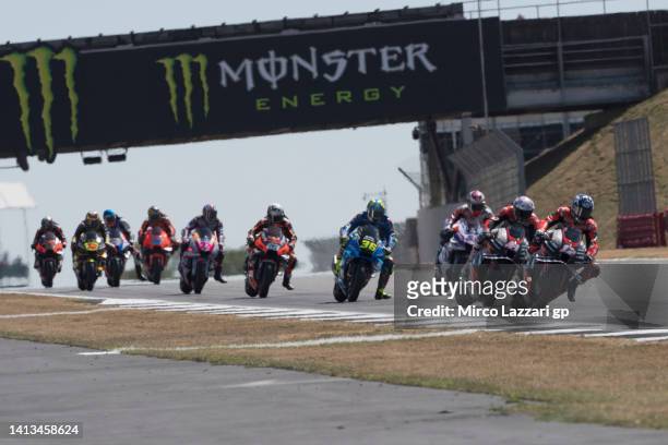 Maverick Vinales of Spain and Aprilia Racing leads the field during the MotoGP race during the MotoGP of Great Britain - Race at Silverstone Circuit...