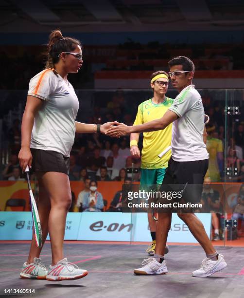 Saurav Ghosal and Dipika Pallikal of Team India celebrate against Donna Lobban and Cameron Pilley of Team Australia during the Mixed Doubles - Bronze...
