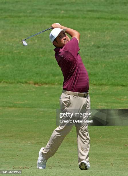 John Huh of the United States plays a shot on the second hole during the final round of the Wyndham Championship at Sedgefield Country Club on August...