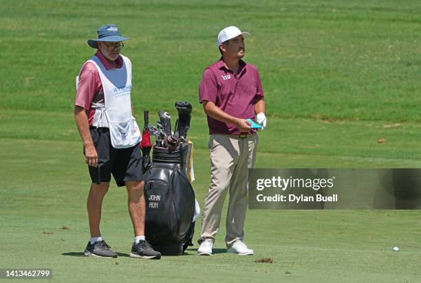 John Huh of the United States prepares to play a shot on the second hole during the final round of the Wyndham Championship at Sedgefield Country...