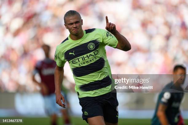 Erling Haaland of Manchester City celebrates after scoring his second goal during the Premier League match between West Ham United and Manchester...