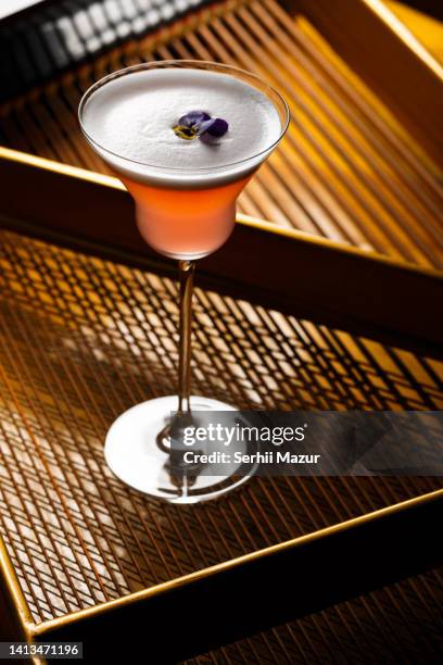juniper manhattan cocktails - stock photo - tangerine martini stock pictures, royalty-free photos & images