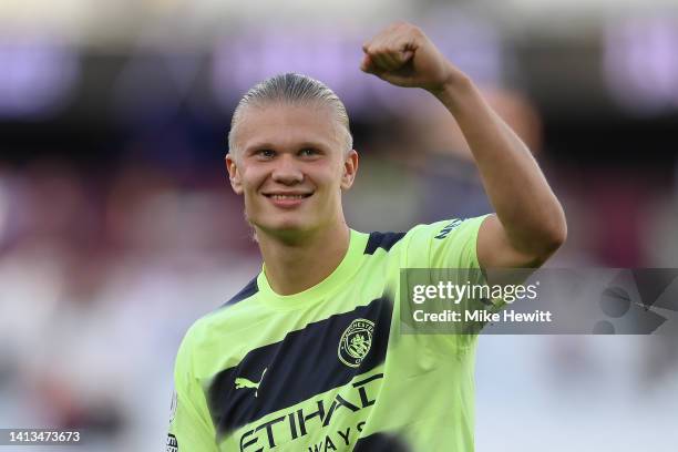 Erling Haaland of Manchester City salutes the travelling fans at the end of the Premier League match between West Ham United and Manchester City at...