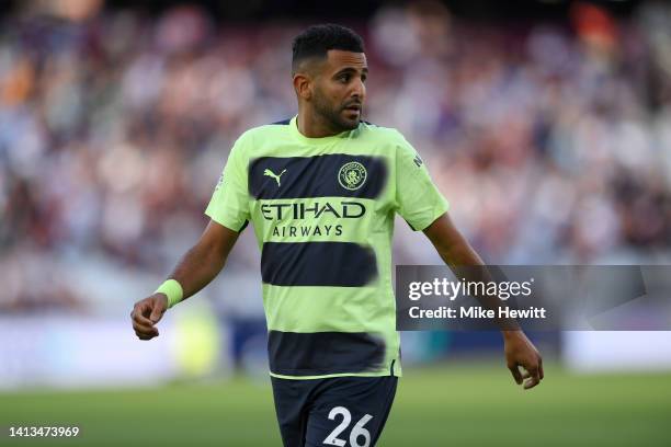 Riyad Mahrez of Manchester City looks on during the Premier League match between West Ham United and Manchester City at London Stadium on August 07,...