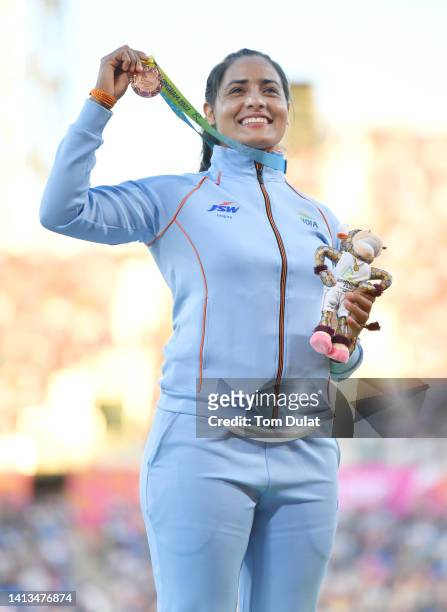 Bronze medalist Annu Rani of Team India Poses for a photo during the medal ceremony for the Women's Javelin Throw Final on day ten of the Birmingham...