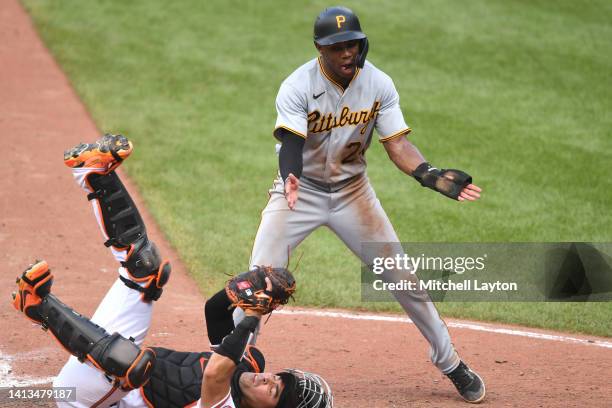 Greg Allen of the Pittsburgh Pirates is safe at play on Robinson Chirinos of the Baltimore Orioles in the seventh inning on a Kevin Newman single...