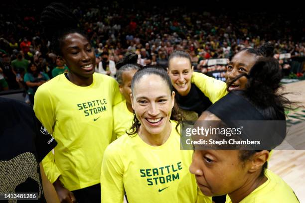 Sue Bird of the Seattle Storm hugs teammates before her last regular season home game of her career against the Las Vegas Aces at Climate Pledge...