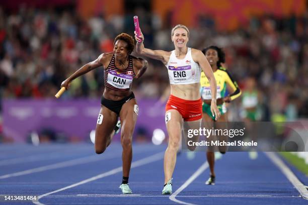 Jessie Knight of Team England crosses the line to win the gold medal ahead of Kyra Constantine of Team Canada who claims the silver medal during the...