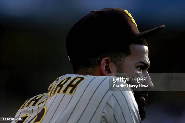 Nomar Mazara of the San Diego Padres looks on to the field from the dugout during the game against the Los Angeles Dodgers at Dodger Stadium on...