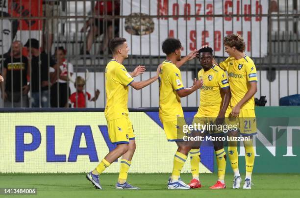 Ben Kone of Frosinone Calcio celebrates his goal with his team-mates during the Coppa Italia match between AC Monza and Frosinone Calcio at Stadio...