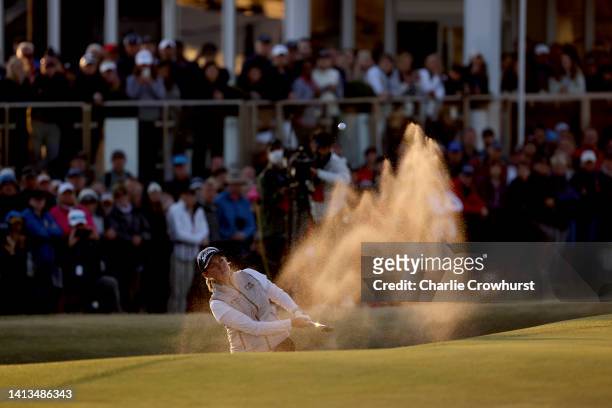 Ashleigh Buhai of South Africa plays her third shot from the bunker on the 18th hole in the second Play off during Day Four of the AIG Women's Open...
