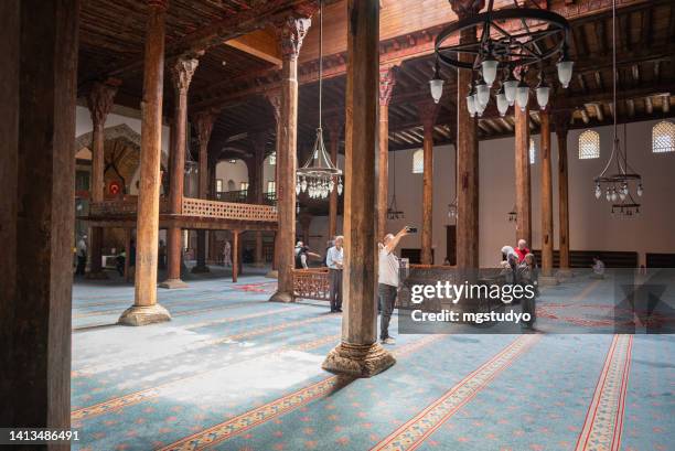 eşrefoglu mosque - five people stock pictures, royalty-free photos & images