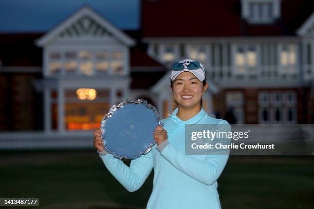 Rose Zhang of United States aposes with the trophy as best amateur player during Day Four of the AIG Women's Open at Muirfield on August 07, 2022 in...