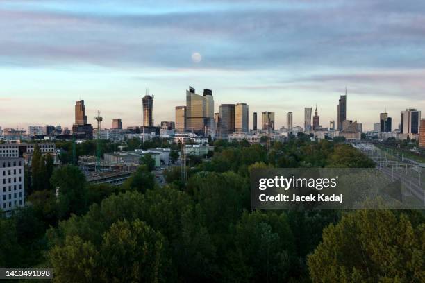 aerial panorama of warsaw city during sunset. - warsaw aerial stock pictures, royalty-free photos & images