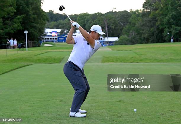 Joohyung Kim of Korea plays his shot from the 18th tee during the final round of the Wyndham Championship at Sedgefield Country Club on August 07,...