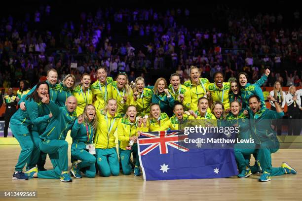 Gold Medallists Team Australia celebrate during the Netball Medal Ceremony on day ten of the Birmingham 2022 Commonwealth Games at NEC Arena on...