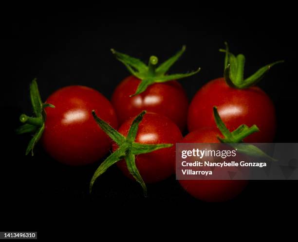 a bunch of red ripe cherry tomatoes - composition stock pictures, royalty-free photos & images