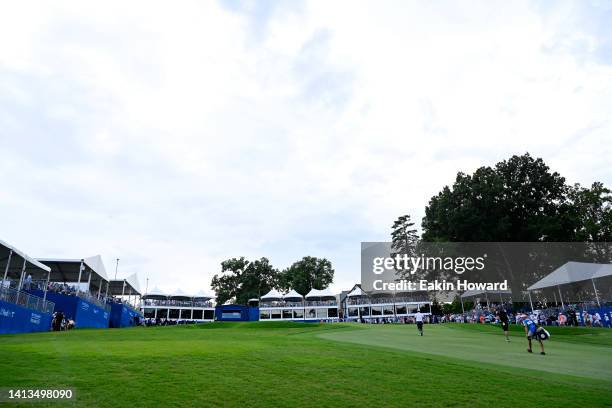 Joohyung Kim of Korea walks on the 18th green during the final round of the Wyndham Championship at Sedgefield Country Club on August 07, 2022 in...