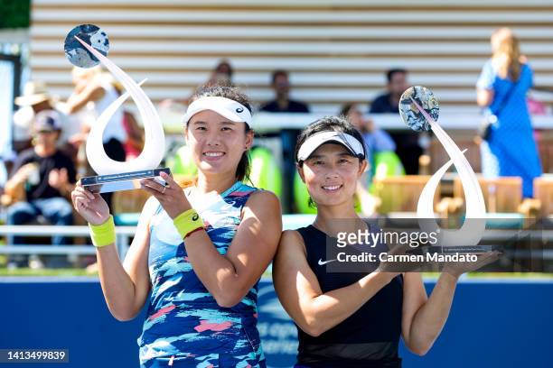 Zhaoxuan Yang of China and Yifan Xu of China pose with their trophies after defeating Hao-Ching Chan and Shuko Aoyama of Japan in the doubles finale...