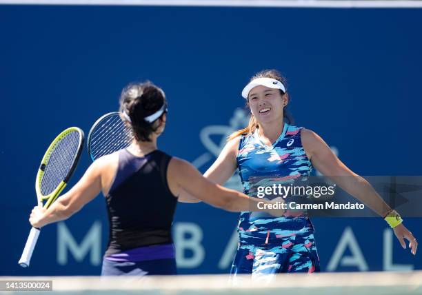 Zhaoxuan Yang of China and Yifan Xu of China celebrate match point after defeating Hao-Ching Chan and Shuko Aoyama of Japan in the doubles finale at...