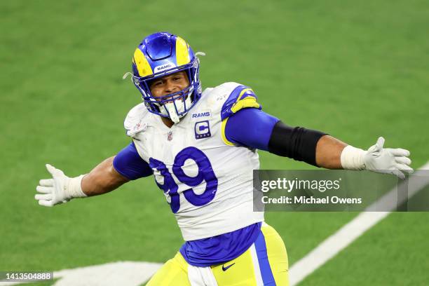 Aaron Donald of the Los Angeles Rams reacts as he celebrates after forcing a turnover on downs against the Cincinnati Bengals during the NFL Super...