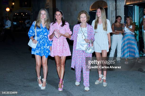 Crown Princess Leonor of Spain, Queen Letizia of Spain, Queen Sofia and Princess Sofia of Spain leave the Beatnik restaurant on August 07, 2022 in...