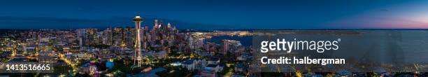 aerial panorama of seattle at night - seattle skyline stock pictures, royalty-free photos & images